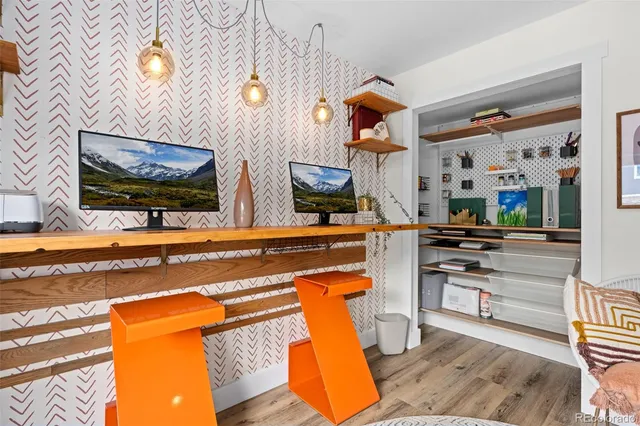 a kitchen with stainless steel appliances kitchen island granite countertop a sink and cabinets