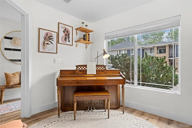 a room with furniture and a window