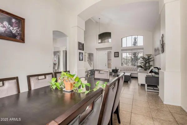 a view of a living room and dining room