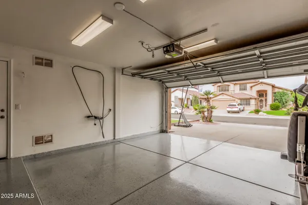 a view of a balcony with a floor to ceiling window