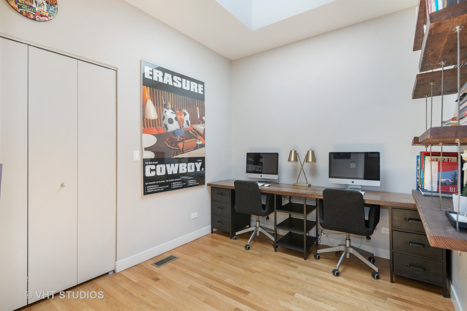 4832 North Clark Street, Unit 117 Chicago, IL 60640 - Photo 12 of 13 a view of a workspace with furniture and a window
