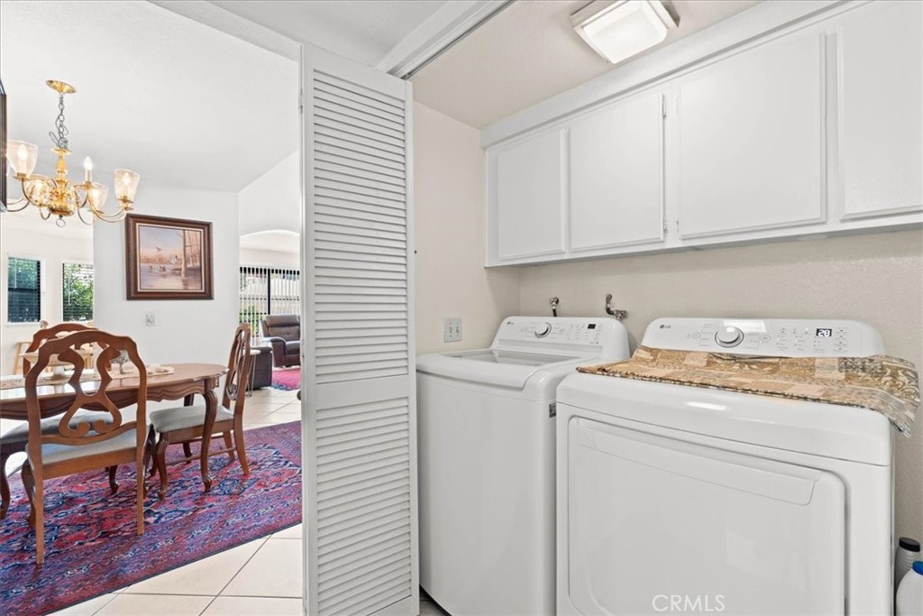 10536 Deerfield Drive Rancho Cucamonga, CA 91701 - Photo 14 of 28 a utility room with dryer and washer