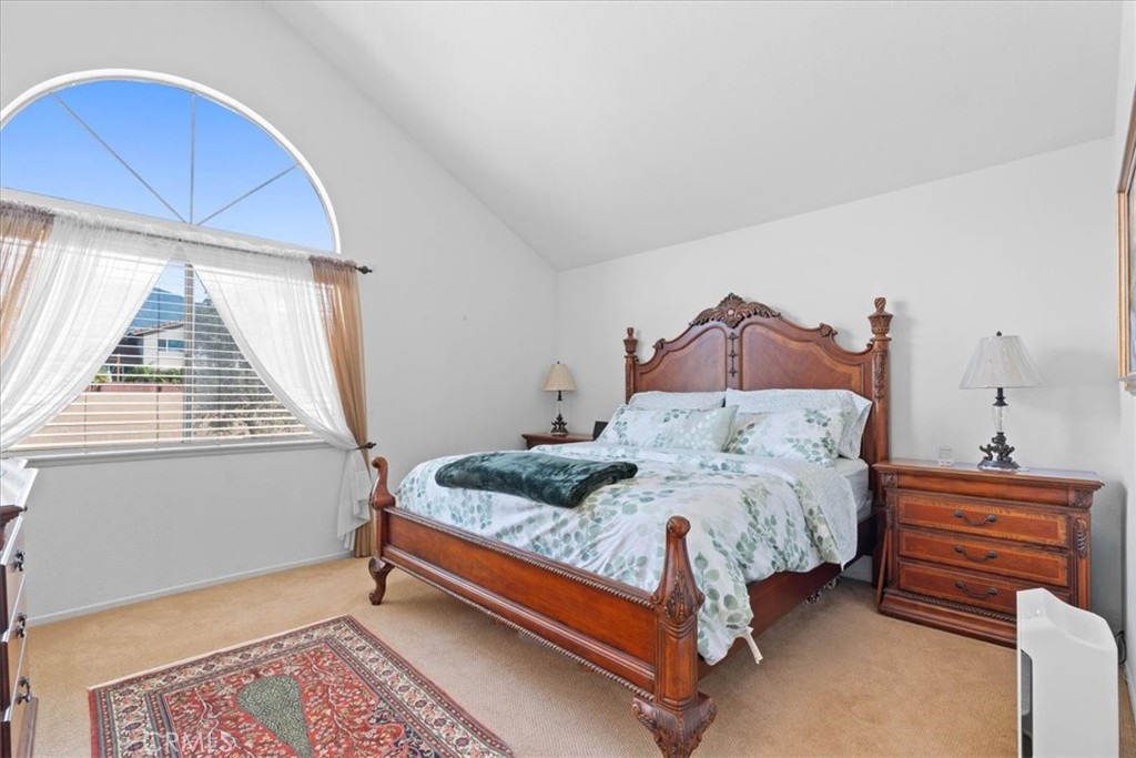 10536 Deerfield Drive Rancho Cucamonga, CA 91701 - Photo 16 of 28 a bedroom with a bed and a window