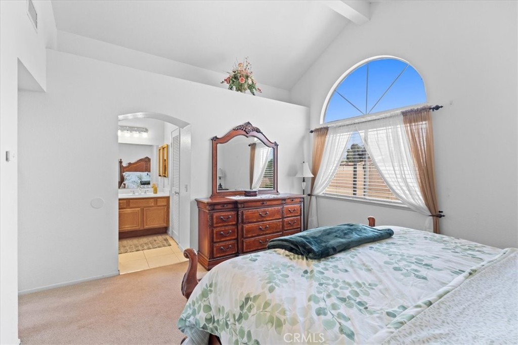 10536 Deerfield Drive Rancho Cucamonga, CA 91701 - Photo 17 of 28 a bedroom with a bed and a dresser