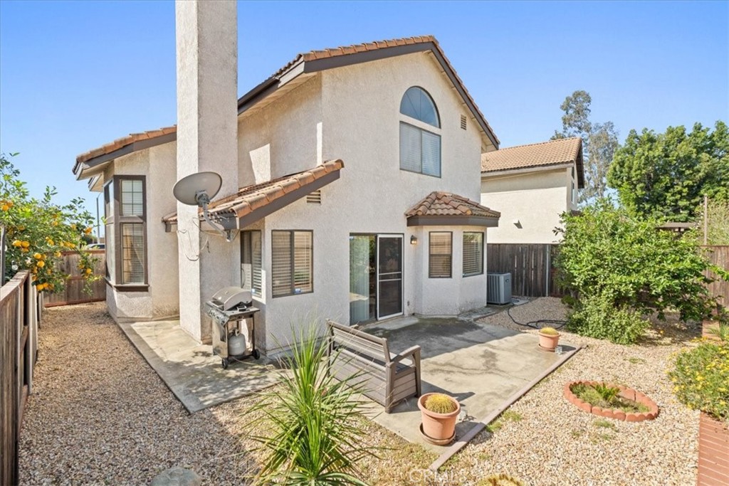 10536 Deerfield Drive Rancho Cucamonga, CA 91701 - Photo 24 of 28 a front view of a house with a yard