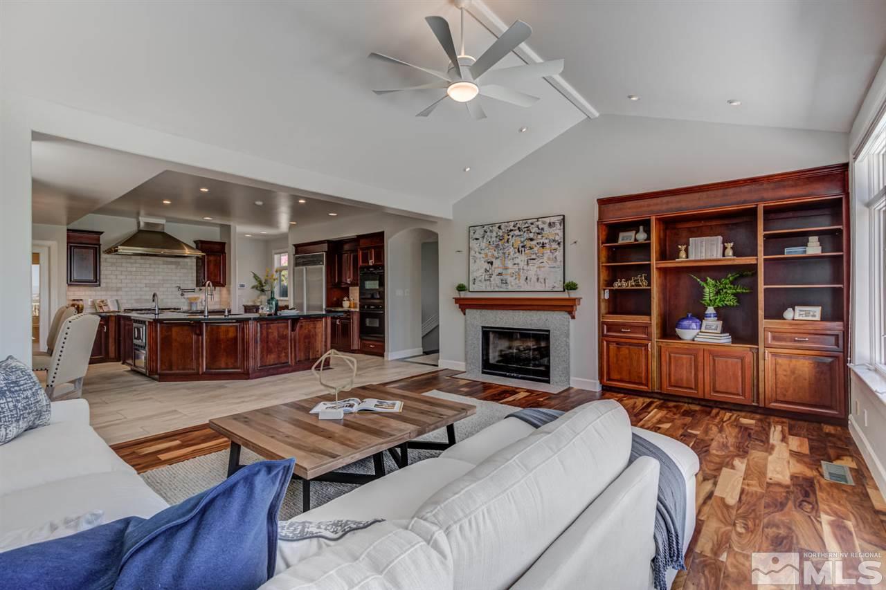 25 Promontory Pointe Reno, NV 89519 - Photo 13 of 40 a living room with furniture and a fireplace