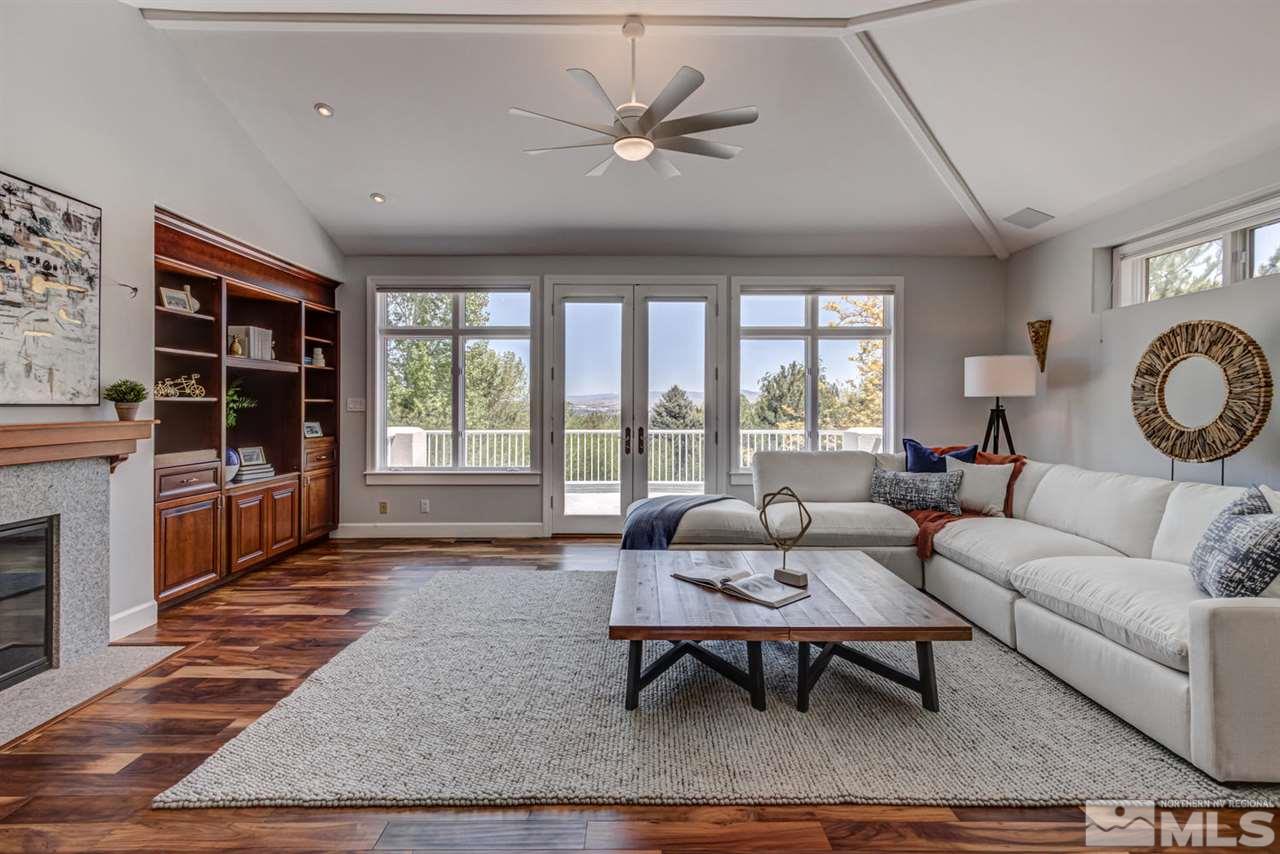 25 Promontory Pointe Reno, NV 89519 - Photo 15 of 40 a living room with furniture and a large window