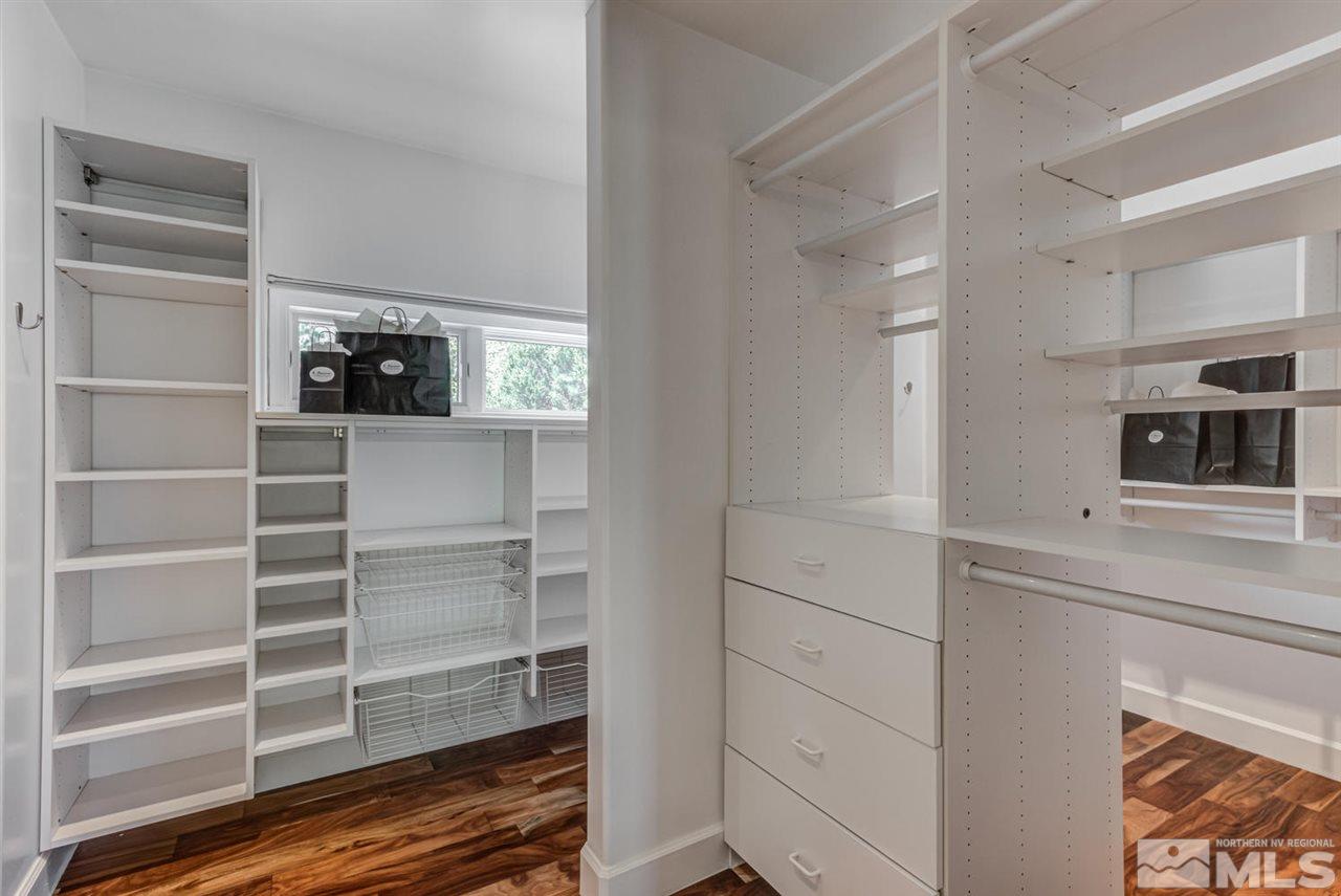 25 Promontory Pointe Reno, NV 89519 - Photo 21 of 40 a view of walk in closet with empty racks