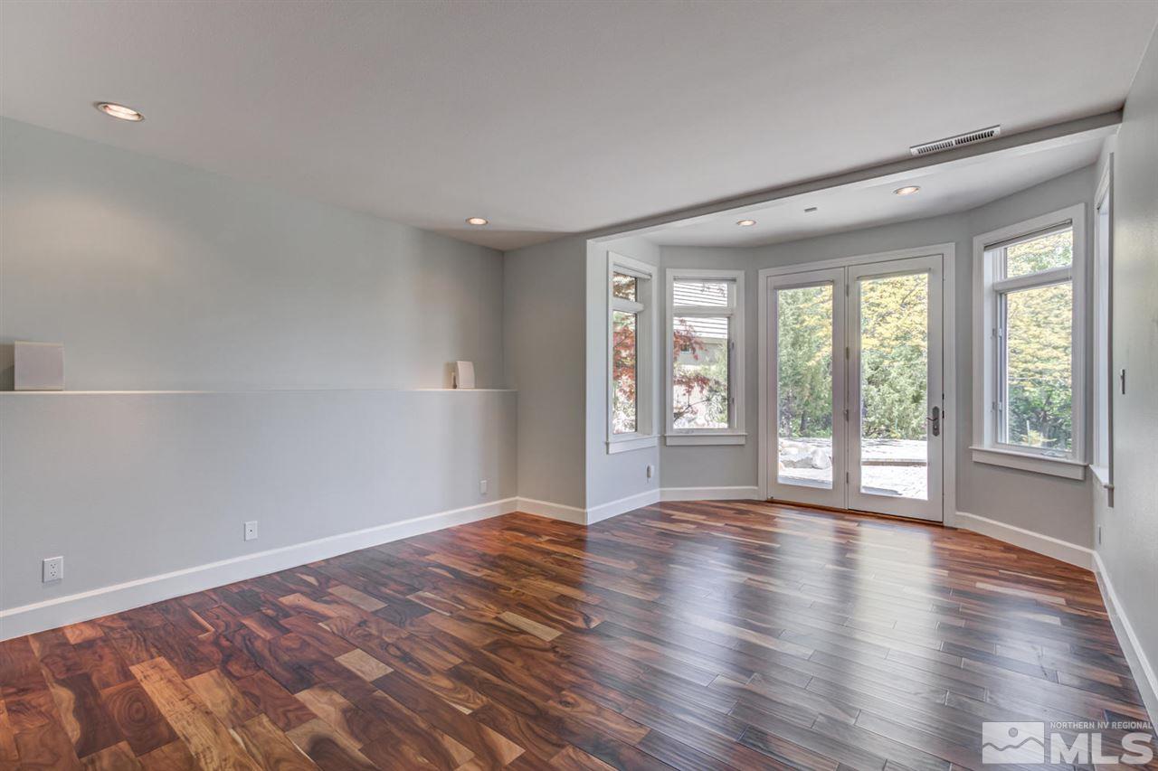 25 Promontory Pointe Reno, NV 89519 - Photo 27 of 40 a view of an empty room with wooden floor and a window
