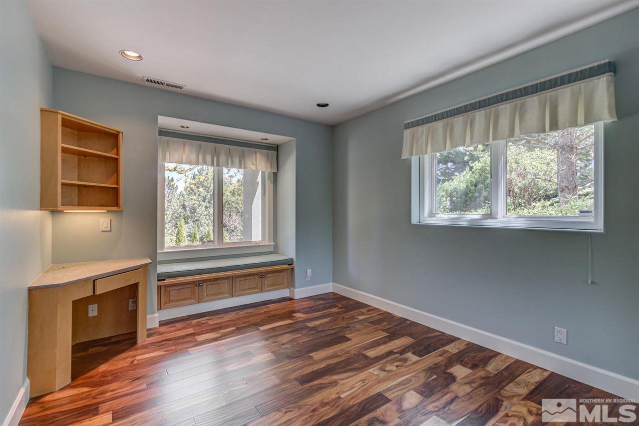 25 Promontory Pointe Reno, NV 89519 - Photo 29 of 40 a view of an empty room with wooden floor and a window