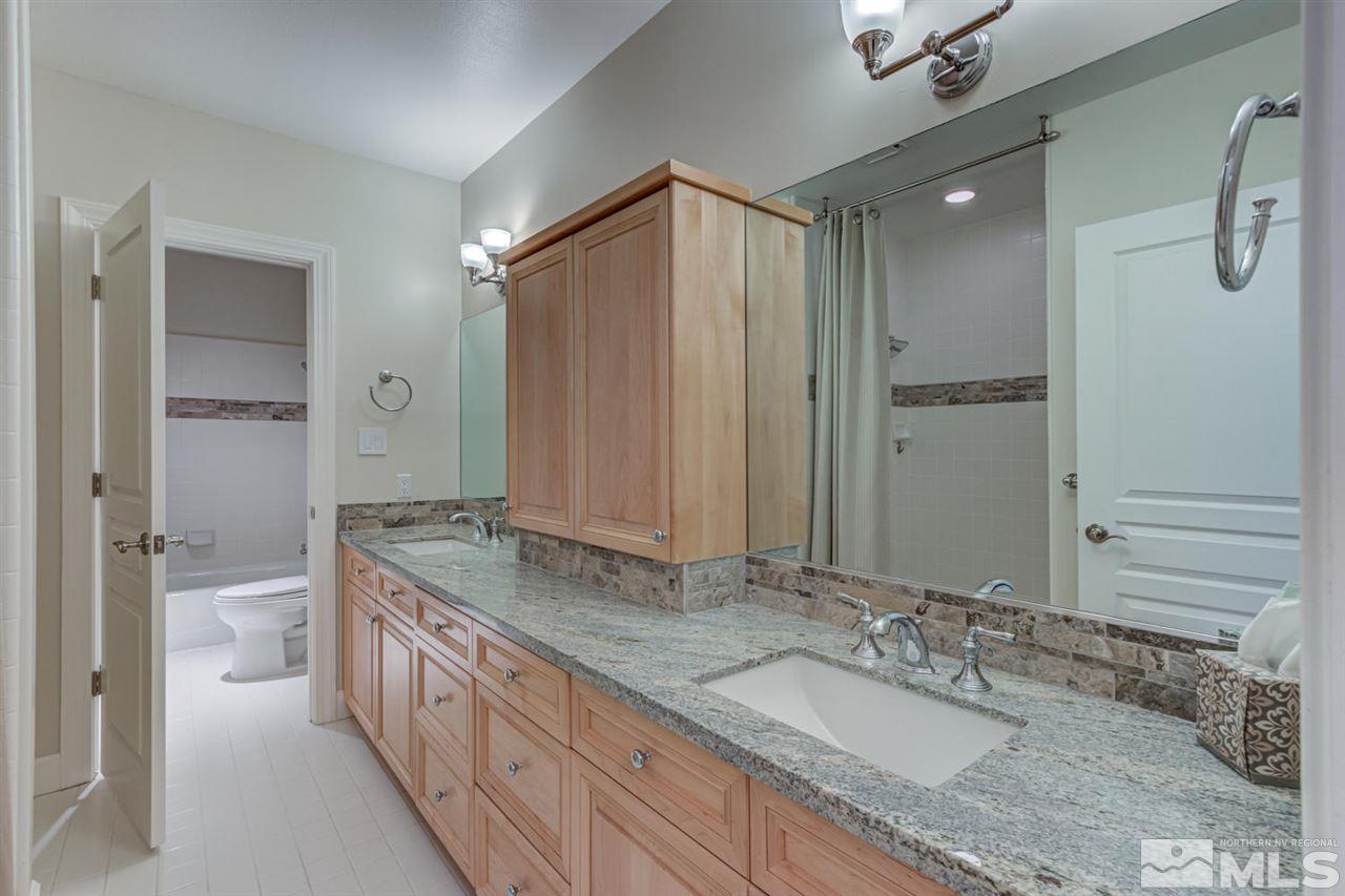 25 Promontory Pointe Reno, NV 89519 - Photo 30 of 40 a bathroom with a granite countertop sink mirror and double