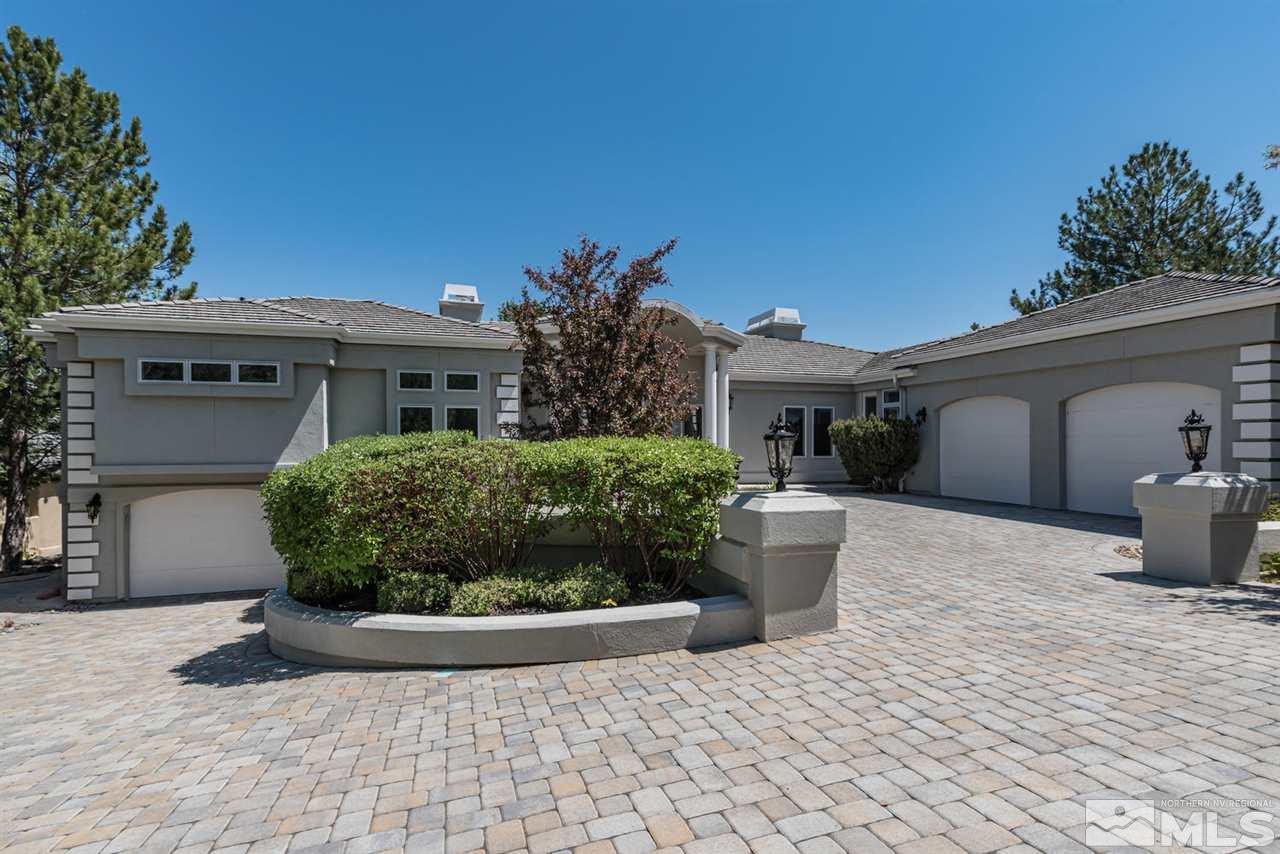 25 Promontory Pointe Reno, NV 89519 - Photo 40 of 40 a front view of a house with a yard and potted plants