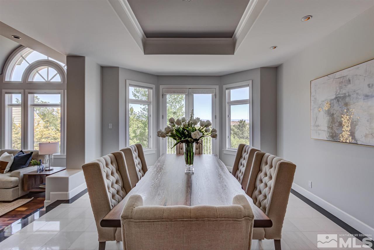 25 Promontory Pointe Reno, NV 89519 - Photo 5 of 40 a view of a dining room with furniture window and wooden floor