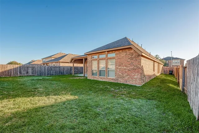 a view of a porch with a backyard