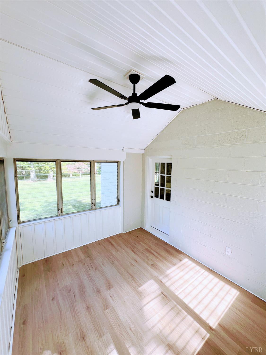 198 Woodbridge Lane Spout Spring, VA 24593 - Photo 11 of 27 a view of empty room with wooden floor and fan