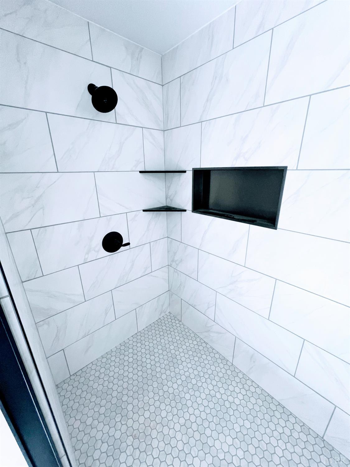 198 Woodbridge Lane Spout Spring, VA 24593 - Photo 14 of 27 a bathroom with a shower