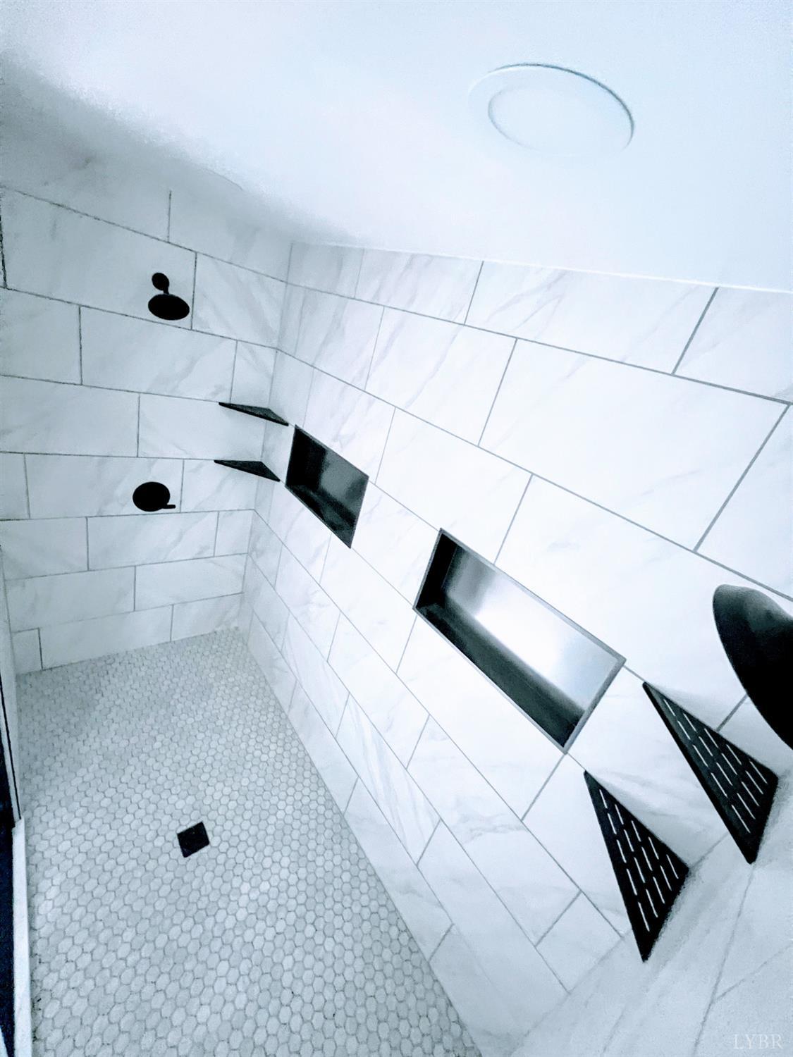 198 Woodbridge Lane Spout Spring, VA 24593 - Photo 16 of 27 a bathroom with a bathtub