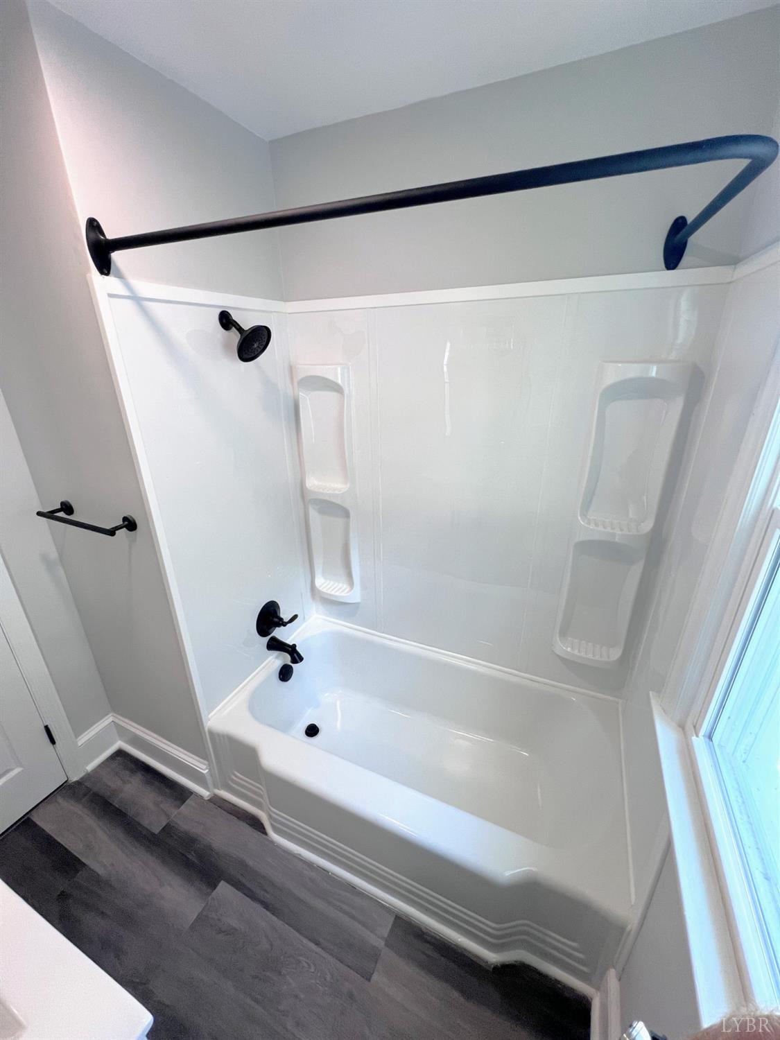 198 Woodbridge Lane Spout Spring, VA 24593 - Photo 19 of 27 a bathroom with a bathtub and a shower