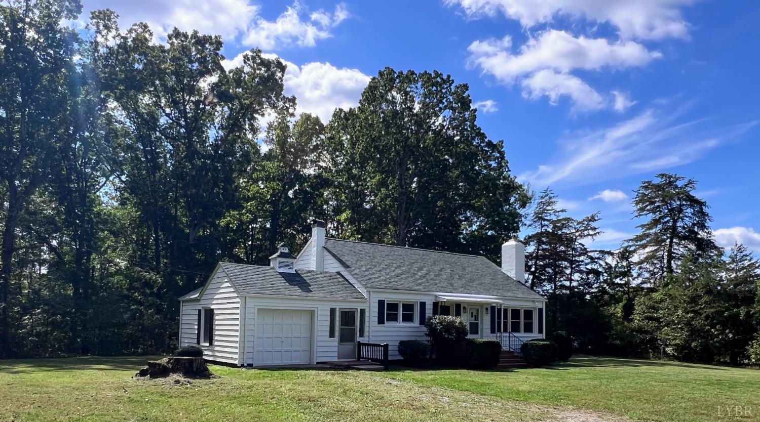 198 Woodbridge Lane Spout Spring, VA 24593 - Photo 23 of 27 a front view of a house with yard porch and green space
