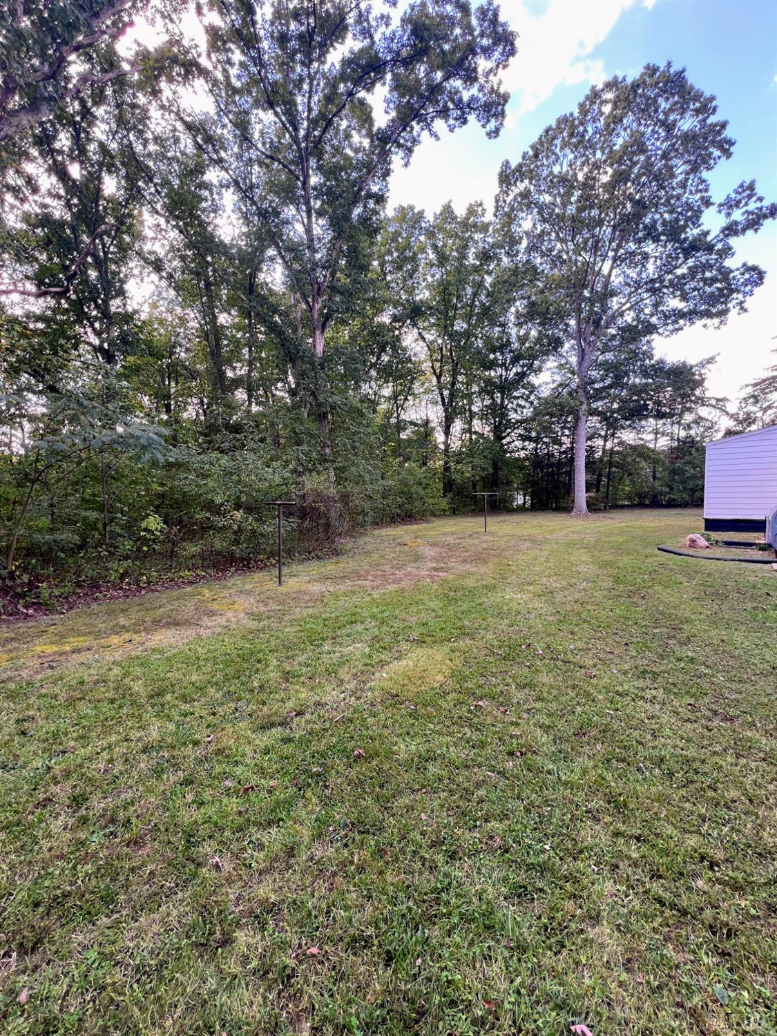 198 Woodbridge Lane Spout Spring, VA 24593 - Photo 27 of 27 a view of a field with trees in front of it