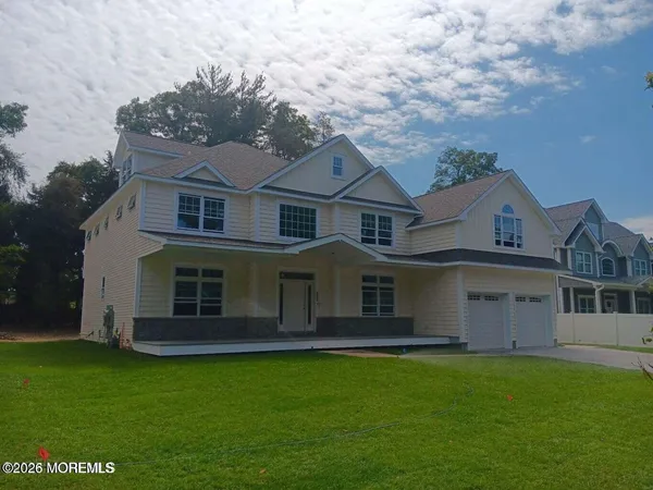 a view of a back yard of the house