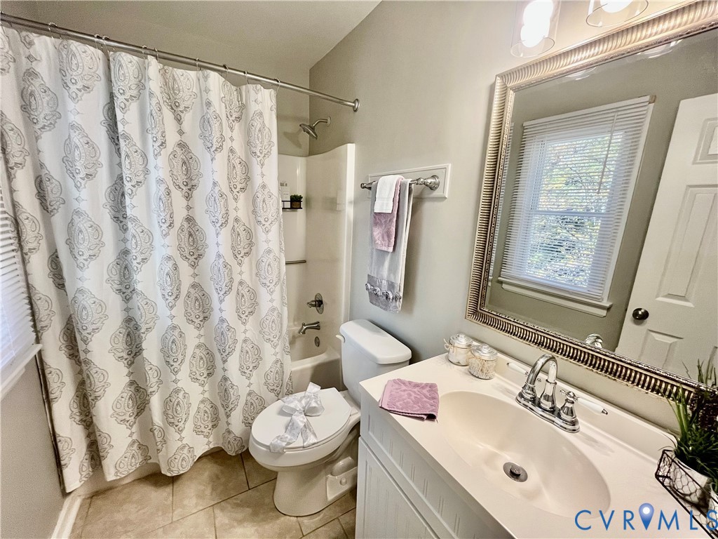 5617 Chatmoss Road Midlothian, VA 23112 - Photo 16 of 23 a bathroom with a sink toilet and shower