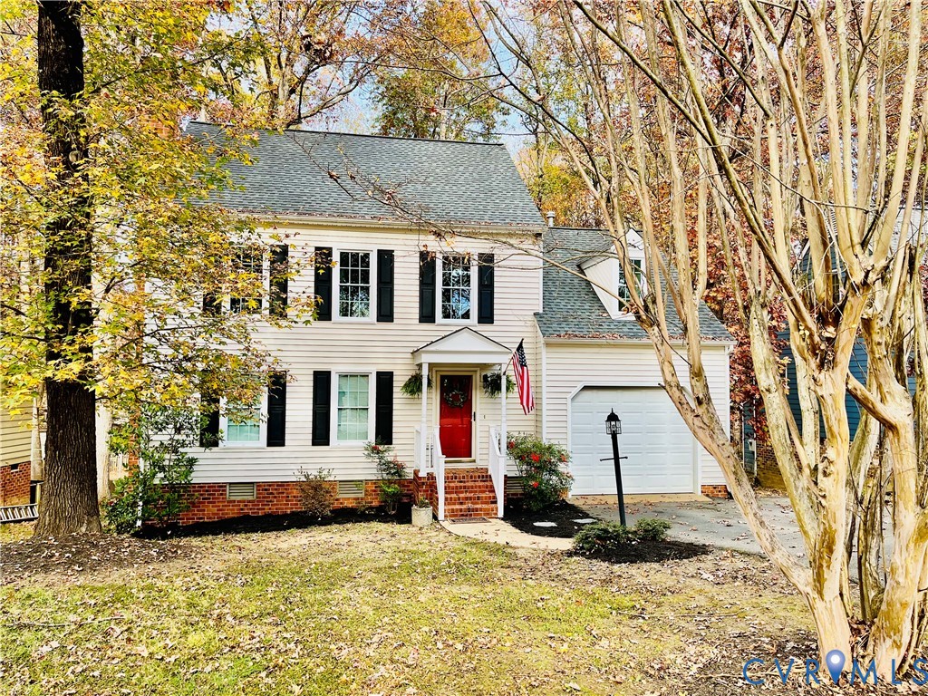 5617 Chatmoss Road Midlothian, VA 23112 - Photo 23 of 23 a view of a white house with large trees and a small yard