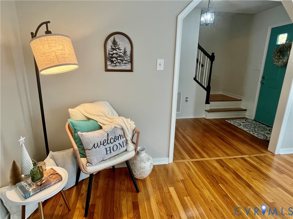 5617 Chatmoss Road Midlothian, VA 23112 - Photo 4 of 23 a room with furniture and a wooden floor