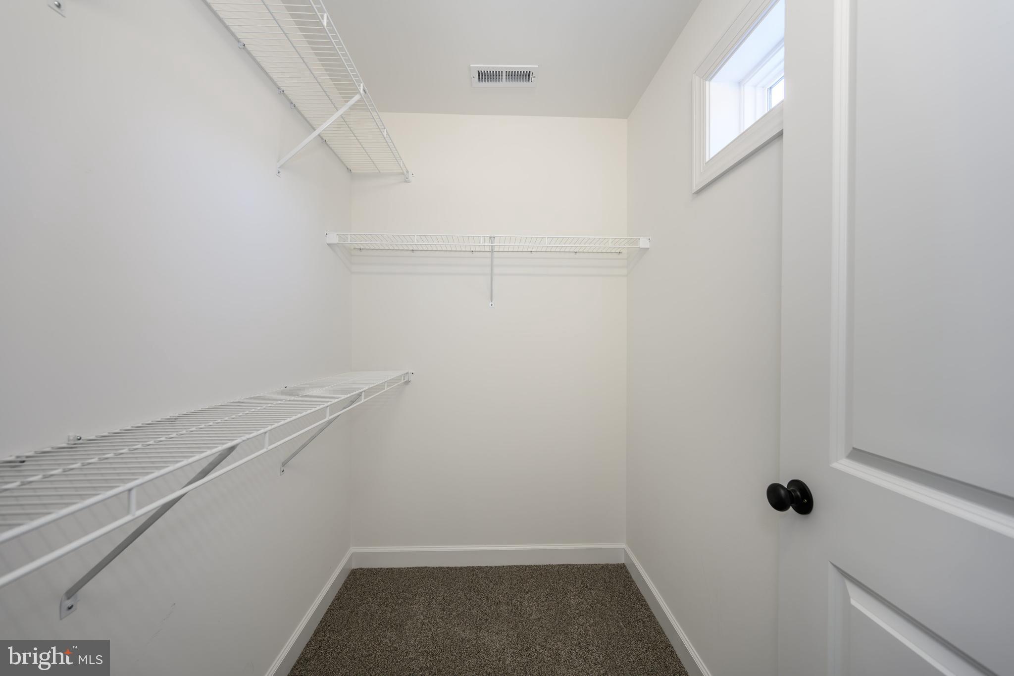 132 Spring Street Centreville, MD 21617 - Photo 9 of 19 a view of small space with racks on the wall