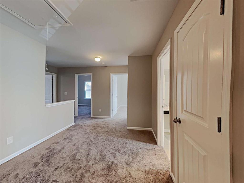 421 Reinhardt Lane Ball Ground, GA 30107 - Photo 13 of 22 a view of entryway with wooden floor