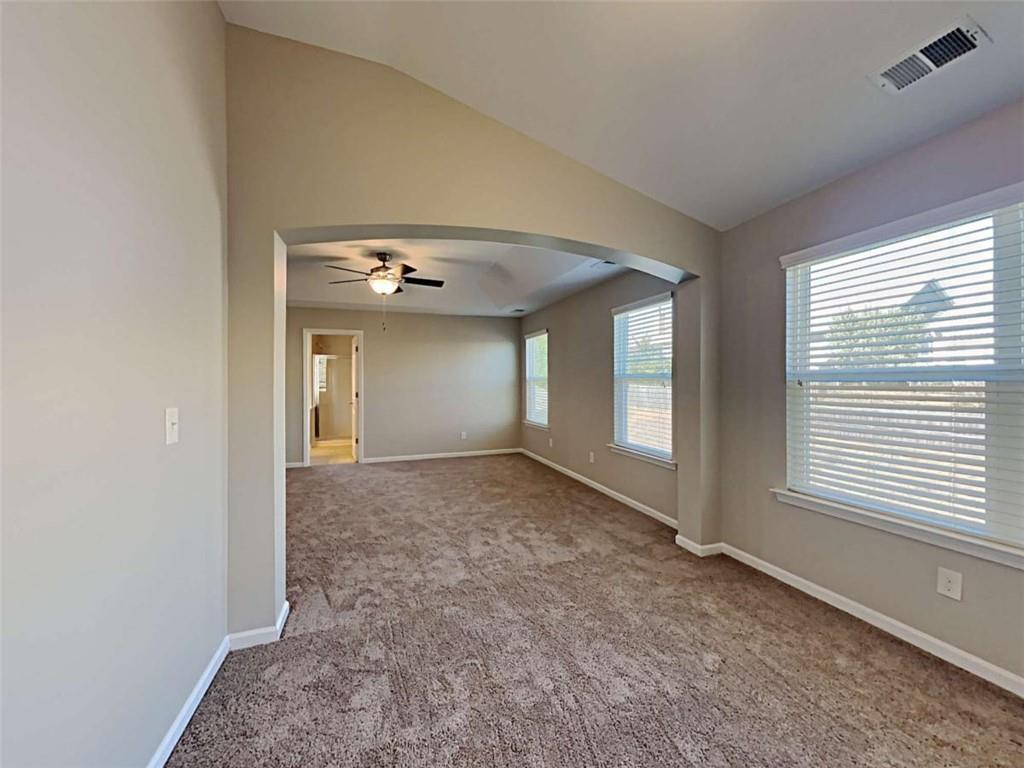 421 Reinhardt Lane Ball Ground, GA 30107 - Photo 4 of 22 a view of an empty room with a window
