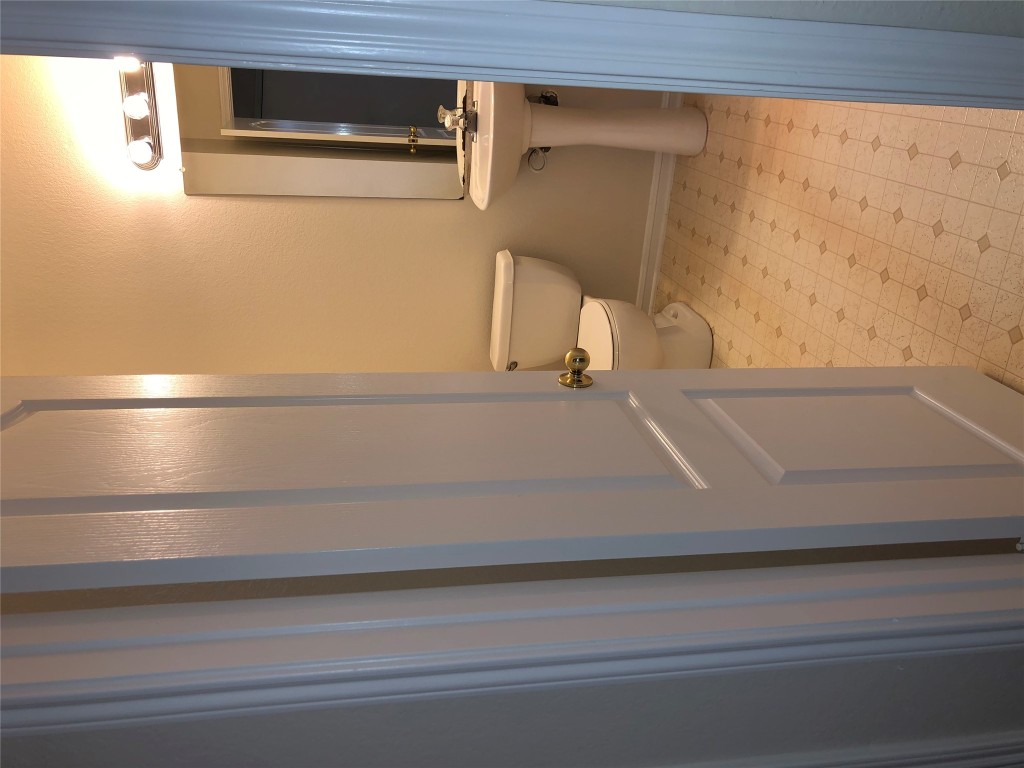 3604 Roller Crossing Austin, TX 78728 - Photo 12 of 40 Half bathroom with light floors and toilet