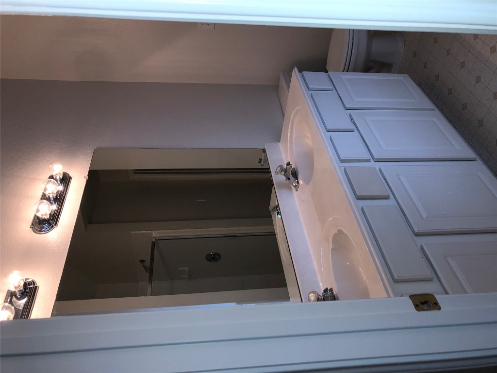 3604 Roller Crossing Austin, TX 78728 - Photo 32 of 40 Full bath featuring a shower stall, double vanity, and light flooring