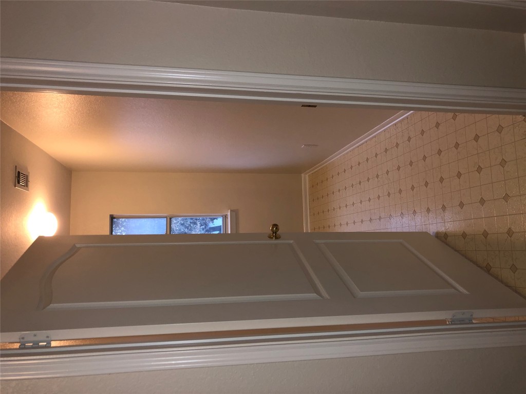 3604 Roller Crossing Austin, TX 78728 - Photo 38 of 40 Corridor featuring light floors and baseboards