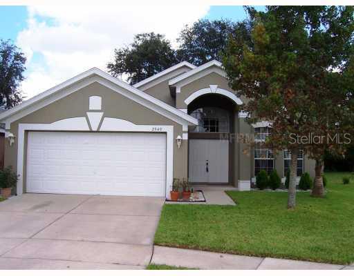 2949 Rivers End Road Orlando, FL 32817 - Photo 1 of 1 a front view of a house with a garden