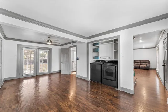 a view of a kitchen with a stove cabinets and wooden floor