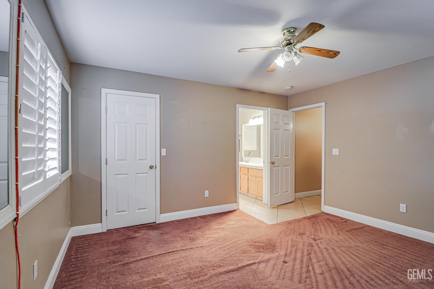 Undisclosed Address Bakersfield, CA 93312 - Photo 19 of 28 wooden floor in an empty room with a window