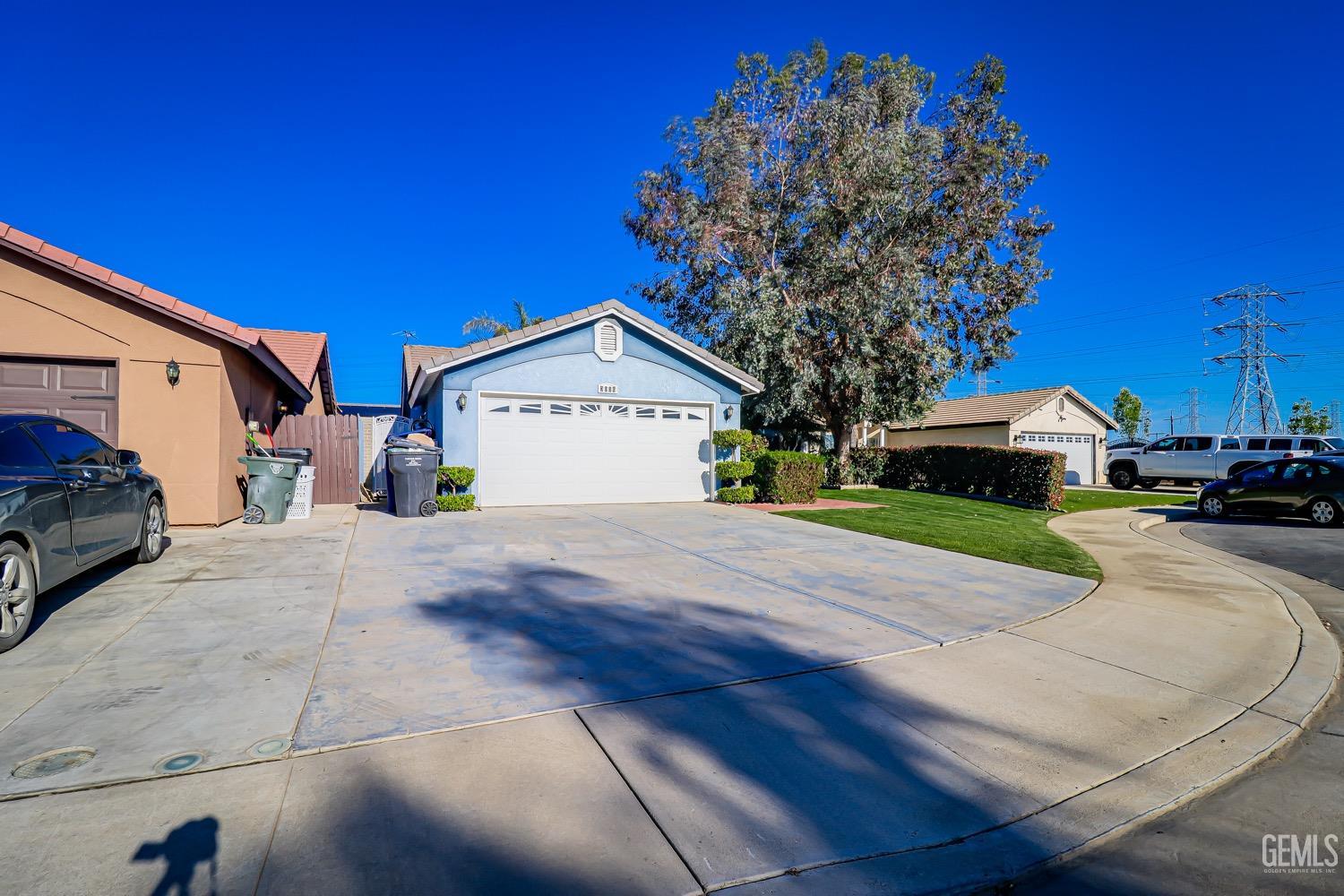 Undisclosed Address Bakersfield, CA 93312 - Photo 2 of 28 a view of road with card parked on road