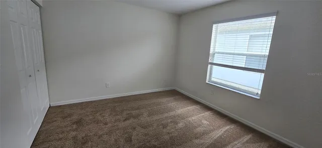 an empty room with a window