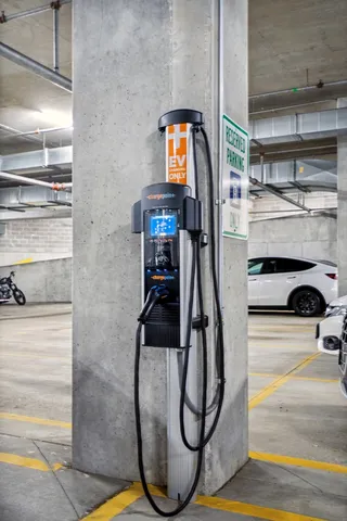 a utility room with multiple dryer and washer