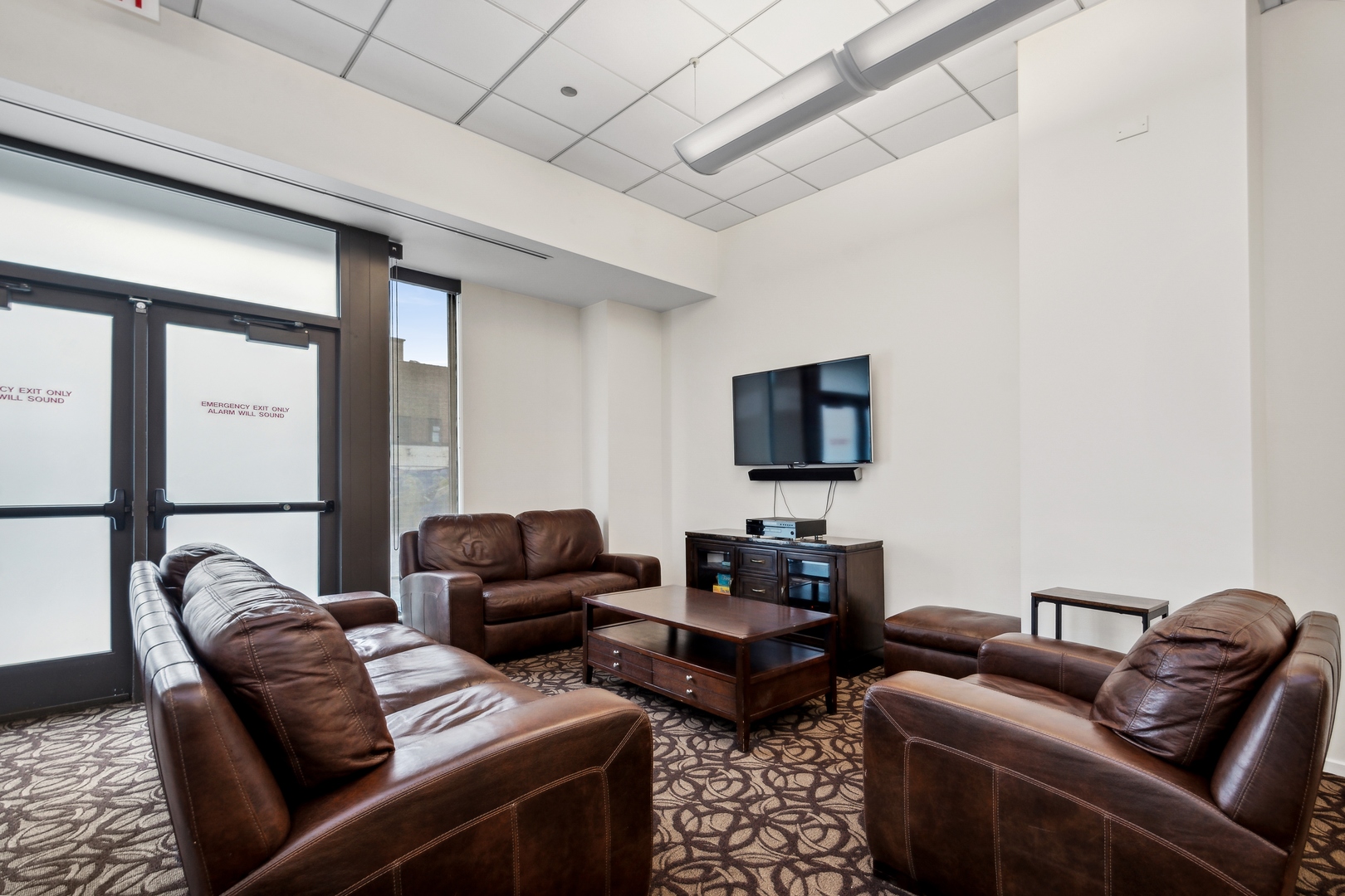 849 North Franklin Street, Unit 1201 Chicago, IL 60610 - Photo 27 of 40 a living room with furniture a flat screen tv and a window