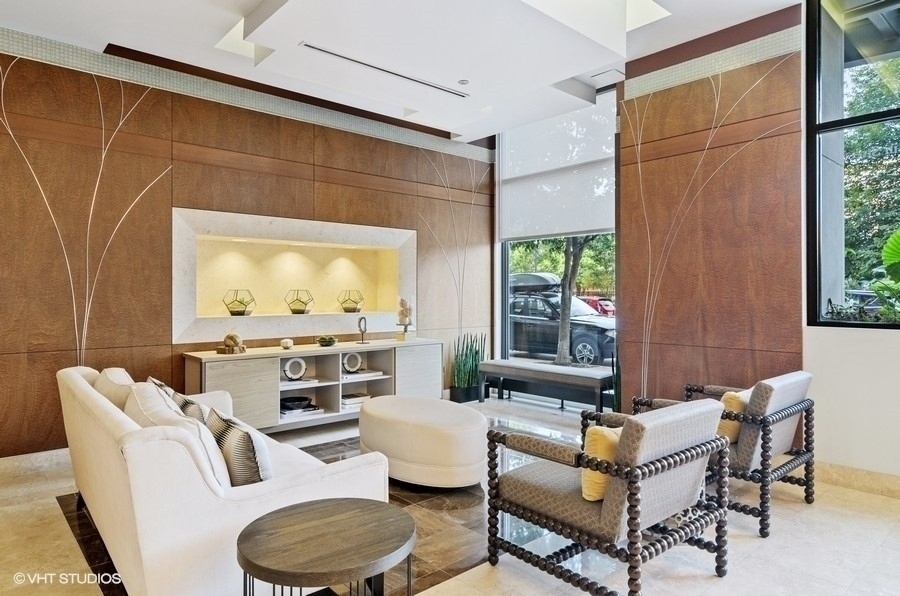 849 North Franklin Street, Unit 1201 Chicago, IL 60610 - Photo 38 of 40 a living room with furniture and a window