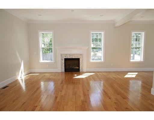 329 Brook Street Framingham, MA 01701 - Photo 18 of 28 a view of empty room with wooden floor and fan