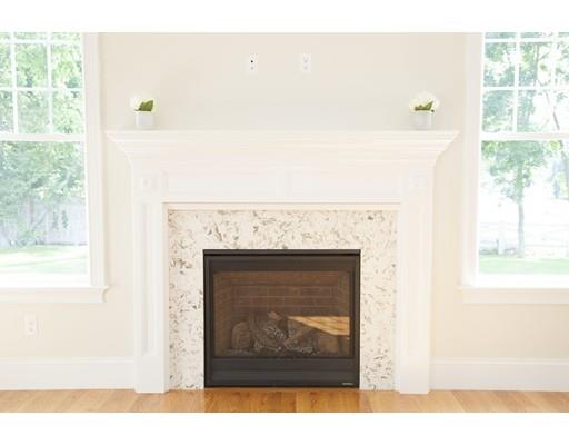 329 Brook Street Framingham, MA 01701 - Photo 19 of 28 a picture of a fireplace with a window