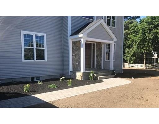 329 Brook Street Framingham, MA 01701 - Photo 2 of 28 a black and white photo of a house