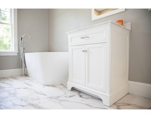 329 Brook Street Framingham, MA 01701 - Photo 22 of 28 a view of a room with wooden floor and cabinet