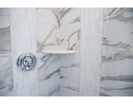 329 Brook Street Framingham, MA 01701 - Photo 23 of 28 a bathroom with a sink and a shower