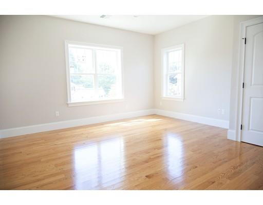 329 Brook Street Framingham, MA 01701 - Photo 24 of 28 a view of an empty room with wooden floor and a window