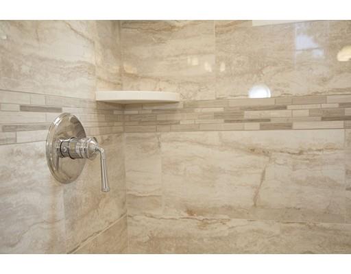 329 Brook Street Framingham, MA 01701 - Photo 26 of 28 a picture of a bathroom with a shower