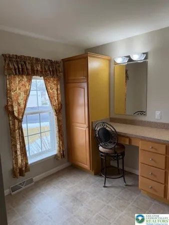 a room with furniture and a window